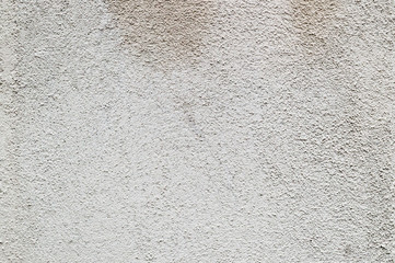 Plaster on the wall closeup texture background, cement surface on the wall