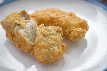 Fried fish fillets.