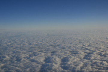 sky, clouds, blue, cloud, view, above, fly, air, high, nature, aerial, space, white, airplane, plane, earth, cloudscape, landscape, atmosphere, flight, heaven, weather, travel, horizon, altitude