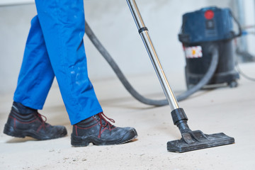 building cleaning service. dust removal with vacuum cleaner