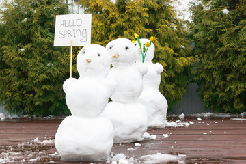 Broken and sad snowmen. The concept of 