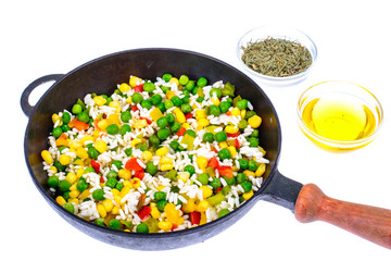 Frozen Hawaiian mix of vegetables with rice in frying pan