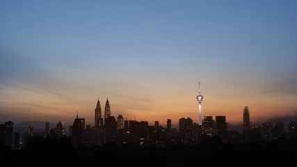 Amazing view of Kuala Lumpur city skyline sunrise.