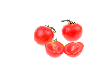 Fresh tomatoes on a white background