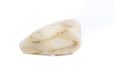 Single natural stone on white background, close-up