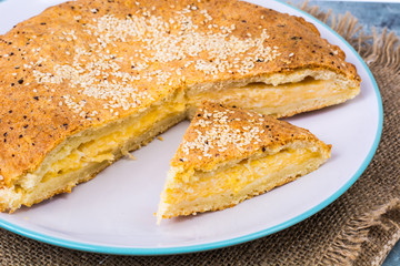 Homemade cake with cheese and sesame seeds