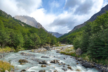 River flows along the Valle Asencio near Refugio Chileno in Torres del Paine National Park, Patagonia, Chile
