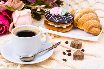 Romantic breakfast. Cup of strong hot espresso and cake