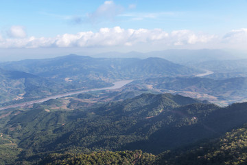 Fototapeta na wymiar landscape view of Doi Pha Tang mountain with Mekong river in afternoon Chiang Rai, Thailand.