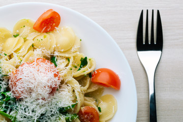 Traditional Apulia region pasta Orecchiette with turnip greens and parmezan, Concept Italian Pasta