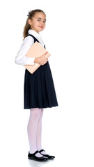 Girl schoolgirl with book.