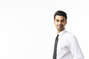 Satisfied, smiling businessman in shirt and tie, isolated on white studio background
