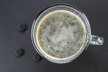 Coal latte. Black cappuccino. Black coffee with activated carbon.