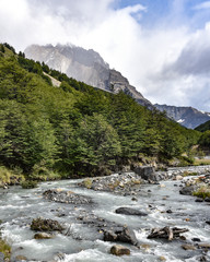 River flows along the Valle Asencio near Refugio Chileno in Torres del Paine National Park, Patagonia, Chile