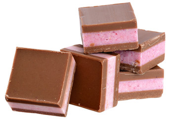 Dark chocolate cubes with fruit berry cream filling isolated