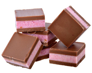 Dark chocolate cubes with fruit berry cream filling isolated