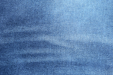 Naklejka premium Navy blue denim background closeup. Jeans texture