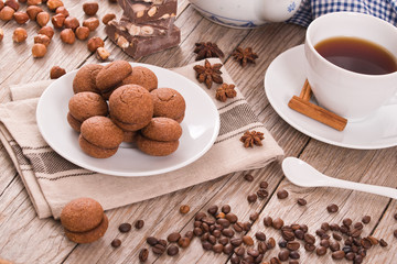 Hazelnut shortbread sandwiches filled with chocolate cream