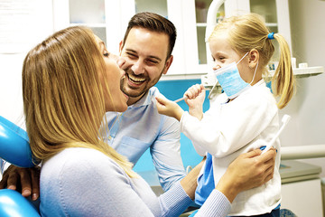 Family in dental office