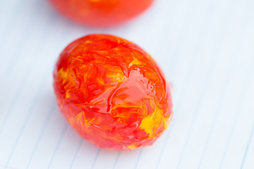 Happy easter day concept : Red color composition egg on colored white background, Easter is festival and holiday celebrating resurrection of Jesus from dead. Space for text