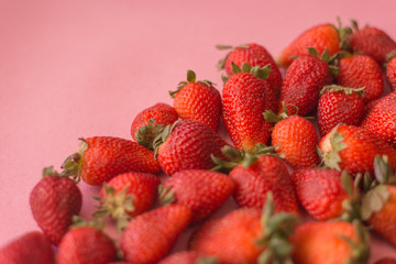 Healthy strawberry isolated on pink background. Copy space.