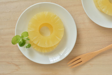 Pineapples on a wooden table


