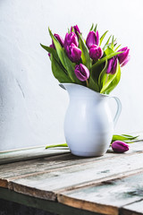 A bouquet of purple tulips in a vase