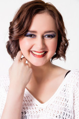 Naklejka premium beautiful girl with short haircut and makeup with blue shadows s
