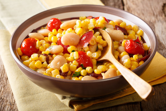 organic salad succotash from the butter beans, tomatoes and bacon close up in a bowl. horizontal