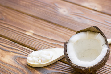 Natural herbal skin care products, top view ingredients coconut on table concept of the best all natural face moisturizer. Facial treatment preparation background