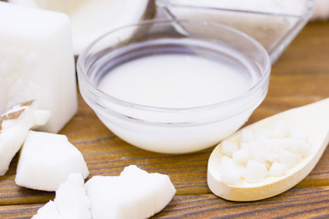 Natural herbal skin care products, top view ingredients coconut on table concept of the best all natural face moisturizer. Facial treatment preparation background