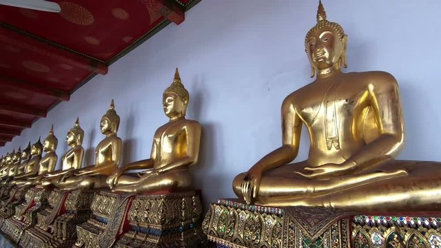Nice Gold Buddha Statue in temple Wat Pho Bangkok, Thailand