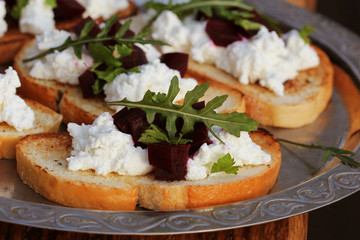 Bruschetta with beet, feta and ruccola. Healthy eating, vegetarian food