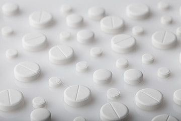 pills background, tablets on a white background