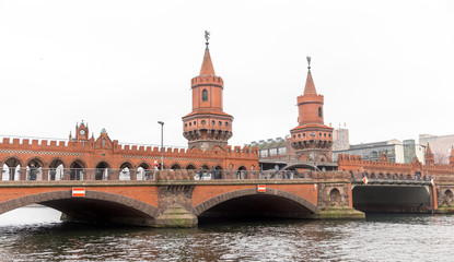 Fototapeta na wymiar Oberbaum Bridge over River Spree in Berlin, Germany