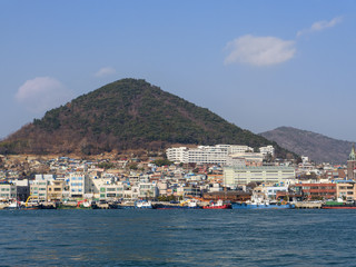 Fototapeta na wymiar Panorama from the sea to Yeosu city. South Korea. January 2018