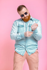 beard man in sunglasses and denim shirt
