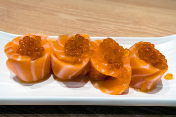 Japanese Fresh Raw Salmon Sushi with Roe Closeup