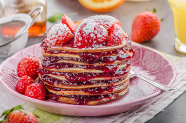 Pancakes strawberry, sugar and jam
