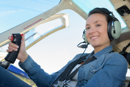 female aviator in the cockpit