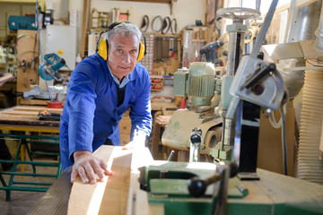 Senior carpenter in workshop