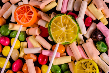 Background of the different multi colored candies. Festive concept