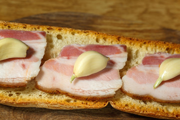 Sandwich with bacon and garlics