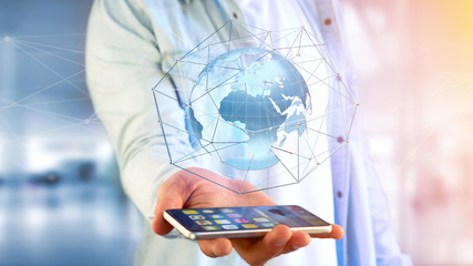 Businessman using smartphone with a Connected network over a earth globe concept on a futuristic interface - 3d rendering