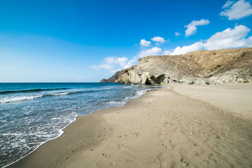 a peaceful beach scene taken at Monsul Beach in Almeria, Spain