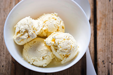 Mango sorbet in white bowl 