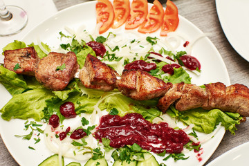 Grilled shish kebab or shashlik on skewers