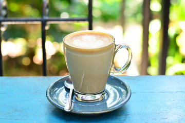 cup of cappuccino on the table