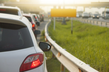 White car on the road go to travel and tourist traffic jam.