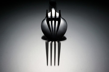 Cutlery concept over black background